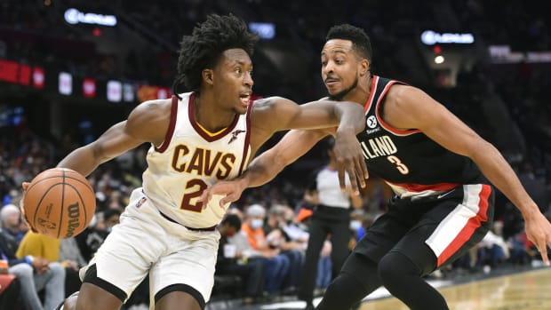 Portland Trail Blazers guard CJ McCollum (3) defends Cleveland Cavaliers guard Collin Sexton (2) in the third quarter at Rocket Mortgage FieldHouse.
